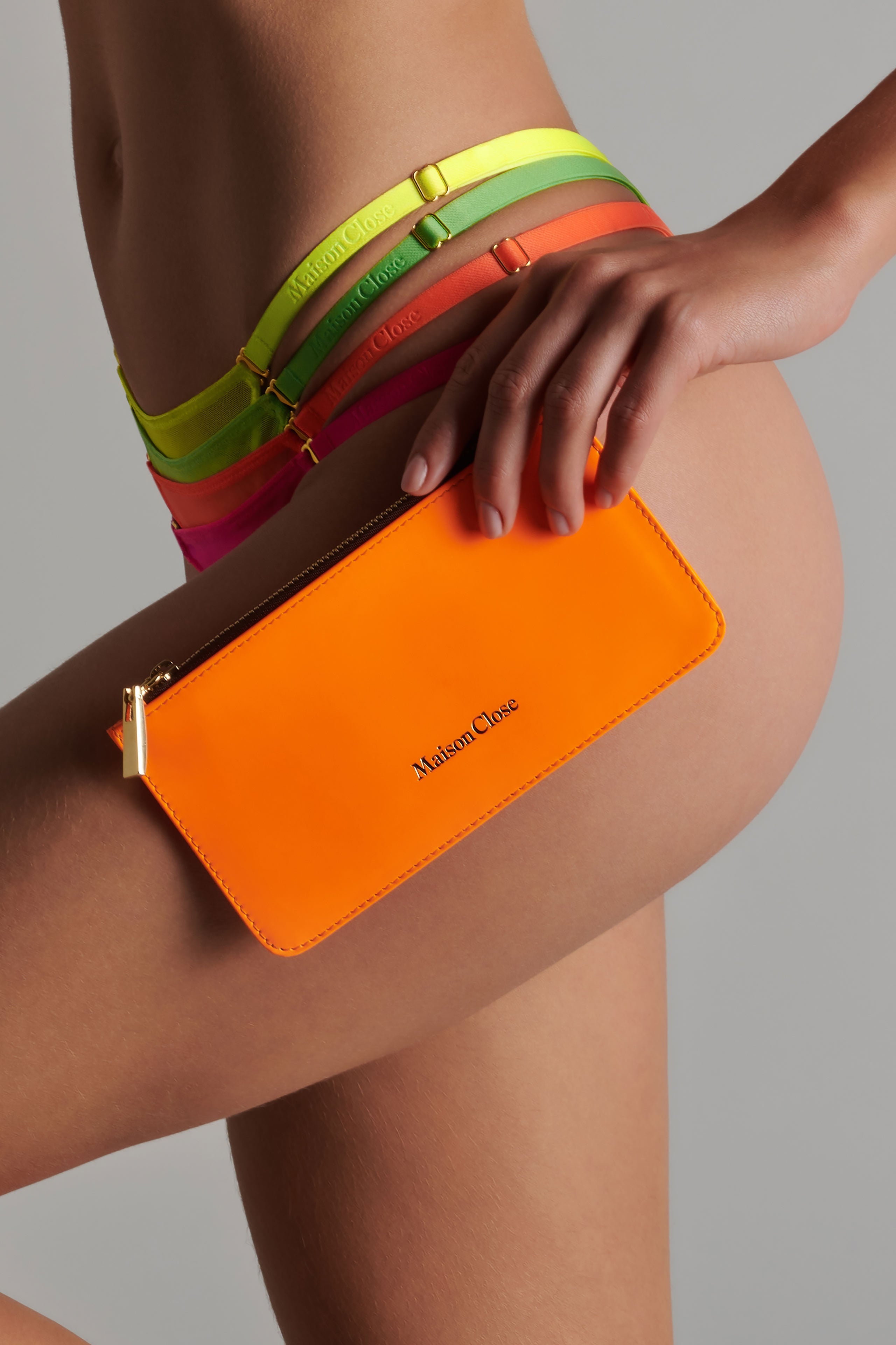 pochette-en-cuir-orange-fluo-maison-close